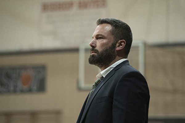 Ben Affleck plays a former Catholic high school basketball star who returns as a coach while battling alcoholism in “The Way Back.” (Warner Bros.)