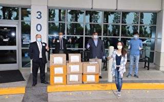 金橙基金会捐赠亚市医院防护服与N95口罩