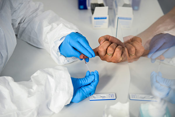 抗體檢測若是偽陽性，將會讓沒有免疫力的人復工。(Omar Marques/Getty Images)