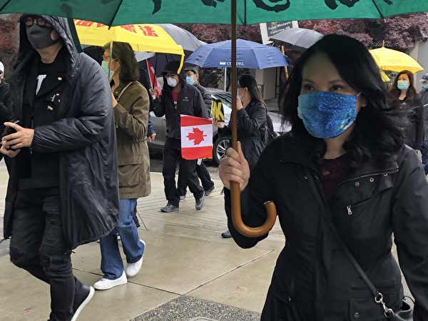 图：温哥华逾千人游行集会，表达对香港手足的声援，对中共暴政的抵制决心。（邱晨／大纪元）