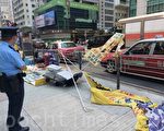 香港法輪功真相點遭襲擊 市民大聲遏止歹徒