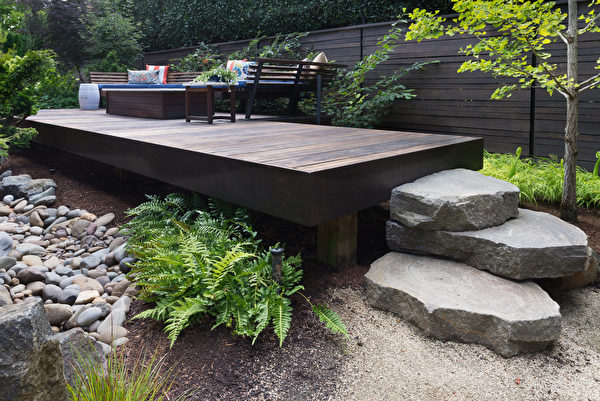 Three,Massive,Rocks,Form,Steps,To,A,Contemporary,Deck,With