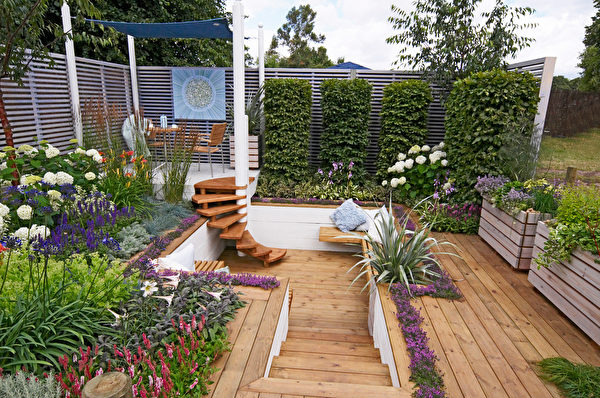 A,Colourful,Show,Garden,With,Seating,And,Decking,For,An