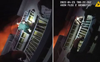 公寓清晨大火 佛州警察冒死爬阳台救下女婴