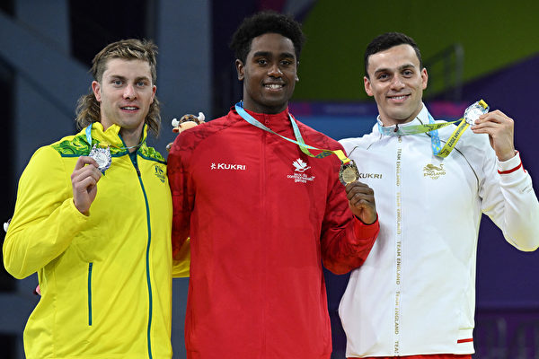 组图：英联邦运动会 男子100米蝶泳冠军出炉