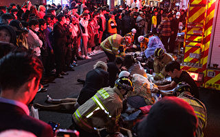 韩国踩踏案幸存者：人群如骨牌般倒下