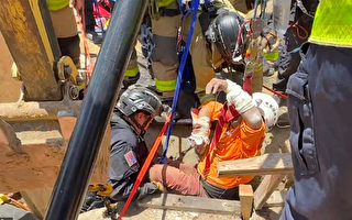 圣地亚哥四十急救员五小时救出建筑工人