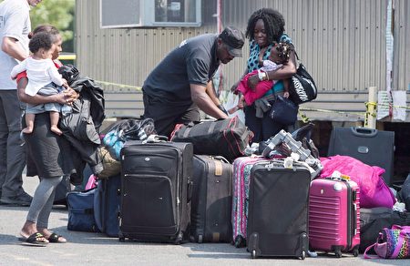 魁北克要求聯邦償還10億元難民安置費用