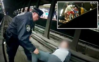 紐約警察英勇救助暈倒在鐵軌上的癲癇男子