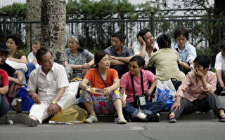 上海民眾上訪遭警方毆打關押