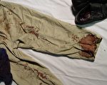 組圖:南非槍擊案受害人血漬斑斑的褲子和鞋
