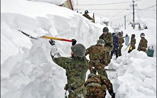 日大风雪死亡增至61人  防卫厅救难队驰援