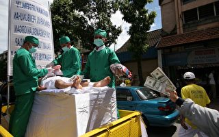 巴厘游行怵目 真人模拟非法器官移植