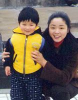 高輝和兒子黃潤合影 (明慧網) 高輝和兒子黃潤合影 (明慧網)
