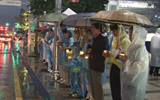 韓法輪功要求新加坡撤訴遭騷擾