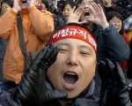 參加罷工活動的鄭俊鎬/AFP