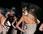 2006 年9月25 日亚曼尼旗下的模特儿，在意大利米兰举行服装展示会。(FILIPPO MONTEFORTE/AFP/Getty Images)