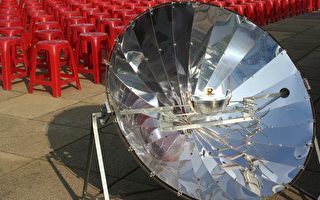 图片新闻:太阳能烹饪器 施展十八般厨艺