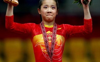 组图：杜哈亚运 女子全能竞技体操 中国披金戴银