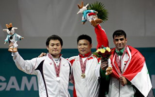 亚运 中国李宏利获男子七十七公斤举重金牌
