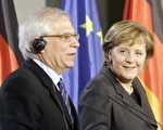 德国总理梅克尔(右)即将接掌欧盟轮值主席，欧洲多数国家期待德国能重振欧洲宪法；不过，欧盟执委会主席巴洛索(左)指出，欧宪如果维持原来的版本不可能生效，目前更重要的是挽救核心的条文。(Photo credit should read MARCUS BRANDT/AFP/Getty Images)