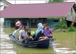 马来西亚南部再遭洪水袭击  两万人无家可归
