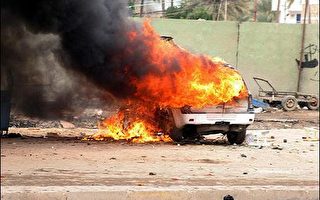 巴格达一市场两汽车爆炸32人死