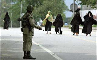 巴国清真寺对峙  激进领袖穿女装图逃亡被捕