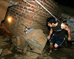 秘鲁规模8强震 逾450死