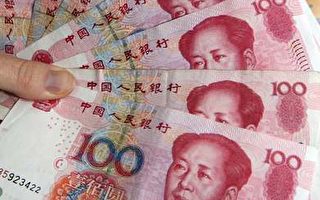 中国昨日公布企业所得税法实施条例从明年1月1日起实施，不分内、外资，所得税率由三十三％统一降为二十五％。(MARK RALSTON/AFP/Getty Images)