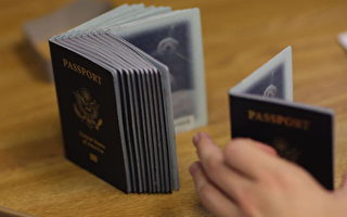 美国护照申请量激增 办理时间或长达四个月