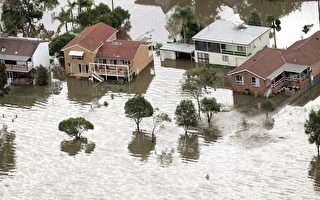 被洪水淹没的民居（ADAM WARD/AFP/Getty Images)