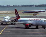 維珍美國航空公司（Virgin America）停在舊金山機場的飛機 (Justin Sullivan/Getty Images)