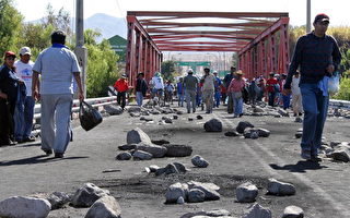 秘鲁采矿利润争议 48名警察被捉后释放