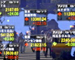 受通膨危機牽累，今年上半年除日本及加拿大外，股巿幾乎全部翻黑，由於變數仍多，全球股市未來前景未卜。(TOSHIFUMI KITAMURA/AFP/Getty Images)