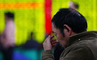 中國大陸A股市場在今年最後一個交易日（12月31日）仍然下跌，是連續第8日跌市，全年計跌超過65%，是歷來最大跌幅。(China Photos/Getty Images)