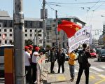 胡錦濤出訪斯洛伐克 法輪功學員被打流血