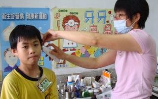 防堵H1N1 台教育部建议全面量体温