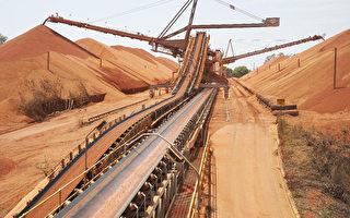 中国钢铁制造商购买铁矿石多付77%