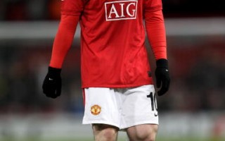 英国曼彻斯特联队前锋鲁尼，被英格兰足球记者协会（FWA）评选为年度最佳球员。(Alex Livesey /Getty Images)