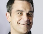 英国流行音乐歌手罗比威廉斯（Robbie Williams）。(图/SEBASTIAN WILLNOW/AFP/Getty Images)