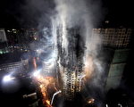 上海這把火，直接暴露出上海大部份高樓沒相應的安全保障，起碼在消防設施上嚴重滯後。(法新社)