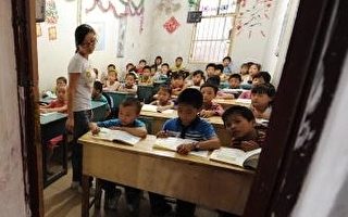 「在全球21個受調查國家中，中國孩子的計算能力排名第一，想像力排名倒數第一，創造力排名倒數第五。為什麼會出現這樣的現象？」 (Photo credit should read STR/AFP/Getty Images)（Stringer: STR / 2010 AFP）