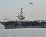 美國核動力航母「喬治•華盛頓號」11月27日將駛入黃海，參加從28日到12月1日的美韓聯合軍事演習。圖為9月4日，該航母抵達馬尼拉進行為期四天的友好訪問。（JAY DIRECTO/AFP/Getty Images)