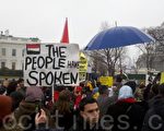 2月5日（周六）近百名人士走上华盛顿D.C.街头游行抗议，要求埃及总统穆巴拉克立即下台。（摄影：余心力/大纪元）