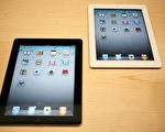 苹果公司3月2日发表的平板电脑iPad2，比上一代的iPad轻与薄。（AFP PHOTO/Kimihiro Hoshino ）