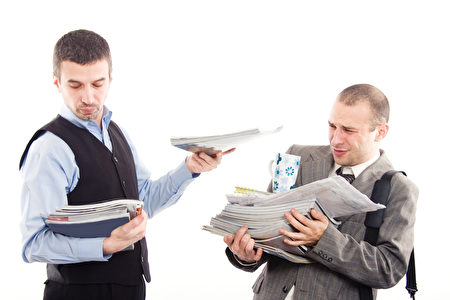 Exhausted businessman with too much work to do Exhausted businessman with too much work to do