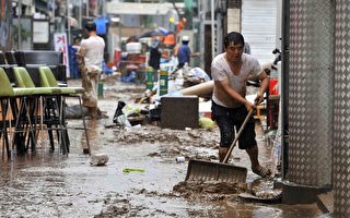 韩国连三天暴雨 过度开发加重灾情