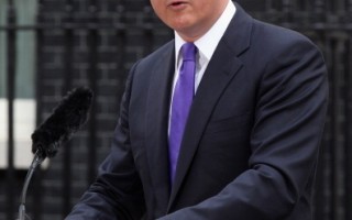 英國首相：利比亞人民決定未來