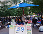 “占领华尔街”活动已经蔓延到美国20多个城市（Staff: Spencer Platt / 2011 Getty Images）